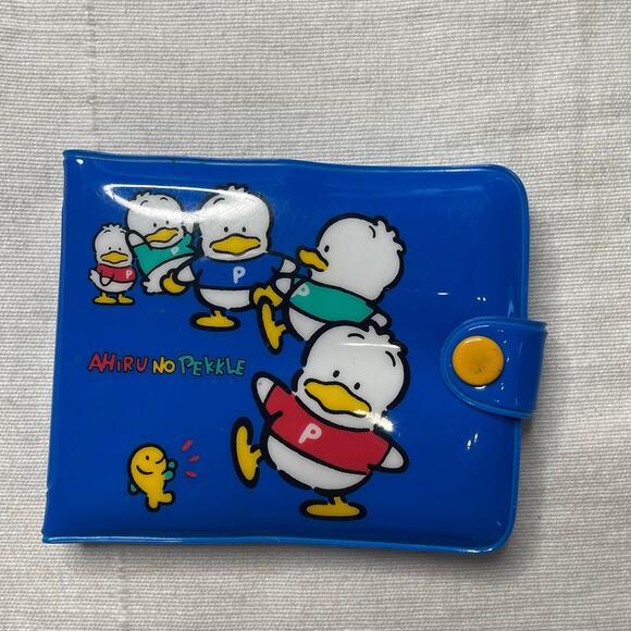 Sanrio Handbags - Vintage Sanrio Ahiru No Pekkle Blue Vinyl Fold Out Wallet Card Case